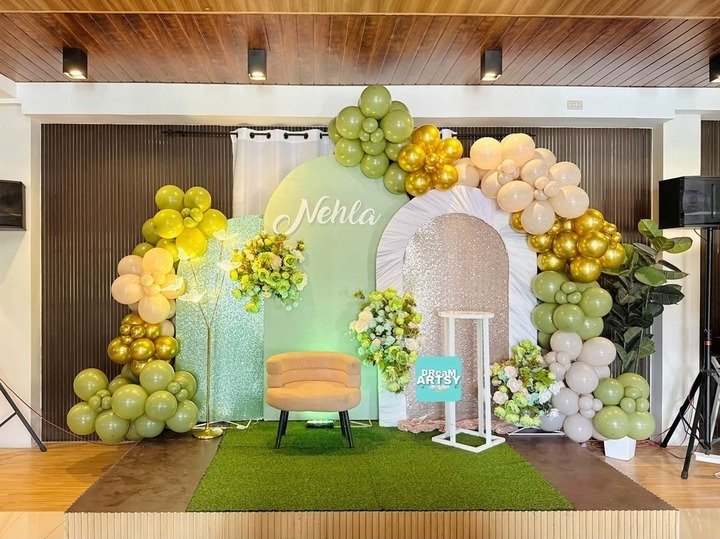 Green summer theme backdrop stage decoration with balloons and flowers in Indirapuram, Ghaziabad